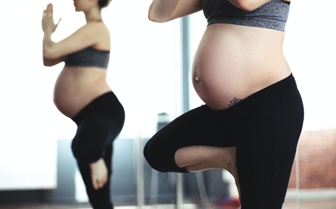 pre and post pregnancy care. women doing yoga whilst pregnant for Health and Wellness Care